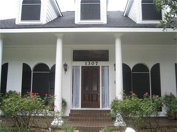 Home has a grand appearance. Tiled front porch, recent paint and roof was replaced in 2014.