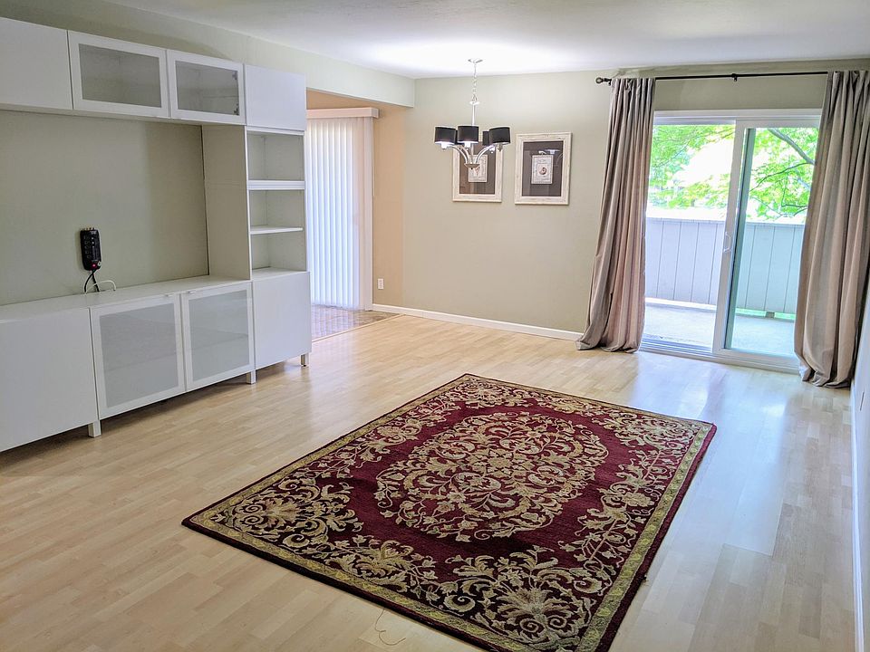 Living & Dining Room; built-in entertainment unit; carpet and artwork and stay or gone