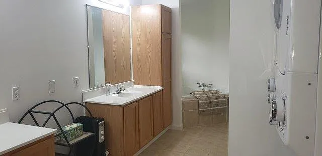 Soaker tub and stand-up shower
