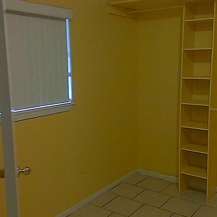 Nice size Wash Room with built in shelves.