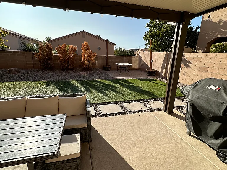 Updated Backyard with turf and pergola