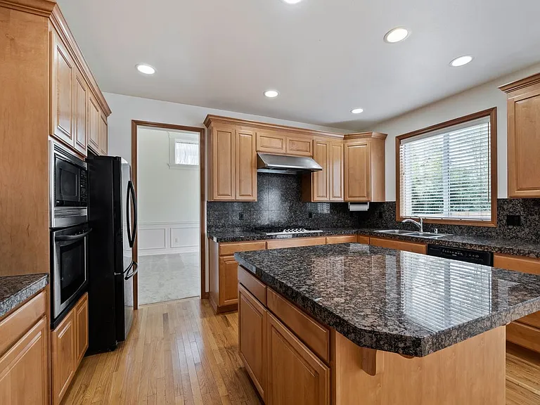 Granite counters with stainless steel appliances