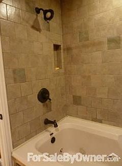 Master bathroom
						:
						Custom built jacuzzi tub with 10 jets, cable connection and area for tv setup