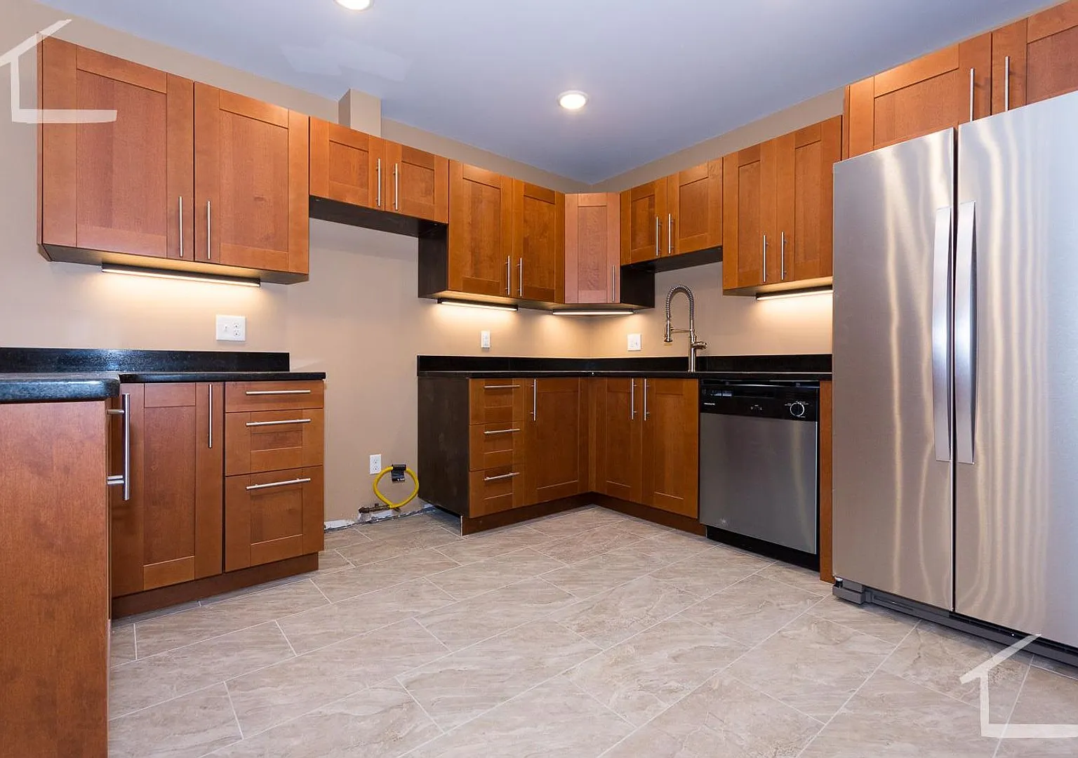 Huge, newly renovated 2 level 5 bed unit near the Green Line! — Photo 1