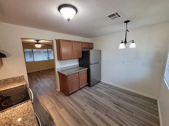 Kitchen, looking through to the living room area.
