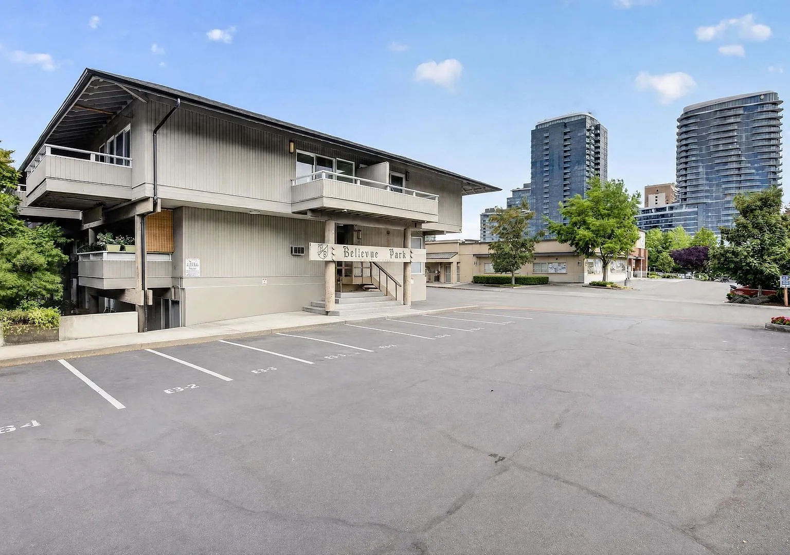 Fully Renovated Sun-Filled Downtown Bellevue Condo with Dual Balconies & Prime Walkable Location — Photo 1