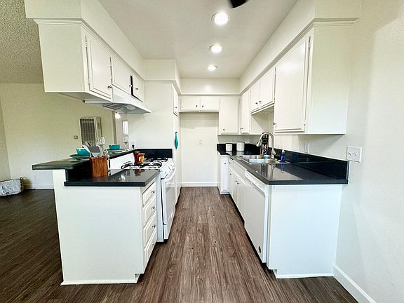 Kitchen with gas stove and new counter tops