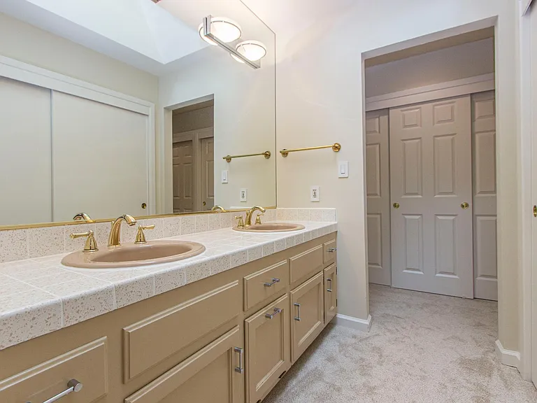 Abundant closet and linen storage in master