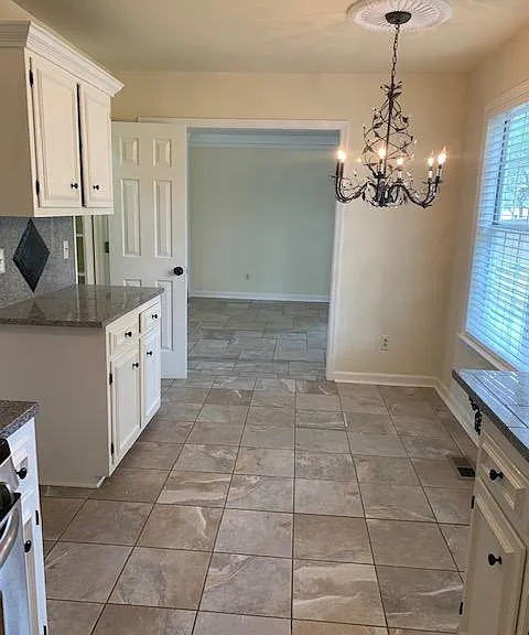 Kitchen opening into Family Room