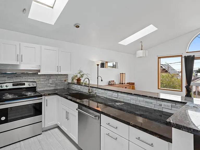 Brand new cabinets, appliances and quartz countertops