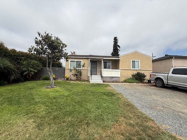 Front yard and driveway for two cars