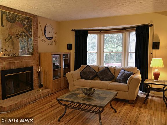 Family Room with bay window and fireplace