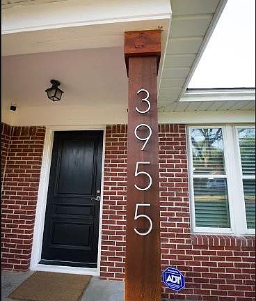 Front step with updated cedar beam