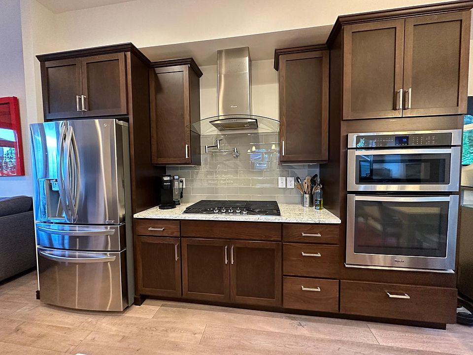 Kitchen with gas stove, stainless appliances