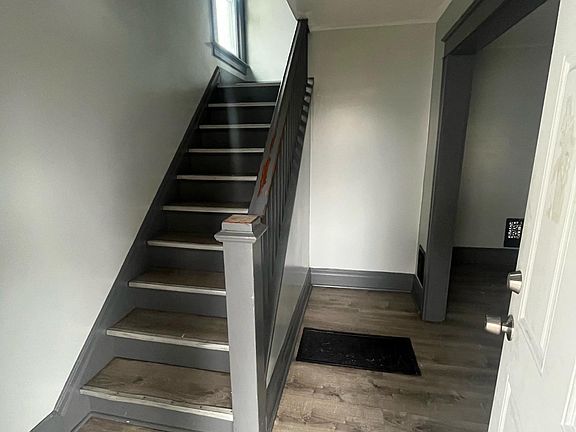 Entrance, on the right is the dining room, the living room, and kitchen. Upstairs is the 3 bedrooms and bathroom.