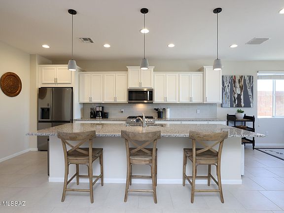 4th image of 7685 W Laurel Ln