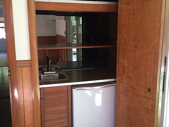 Wet Bar with mini fridge in additional room you can use as a 4th bedroom or Family Room.