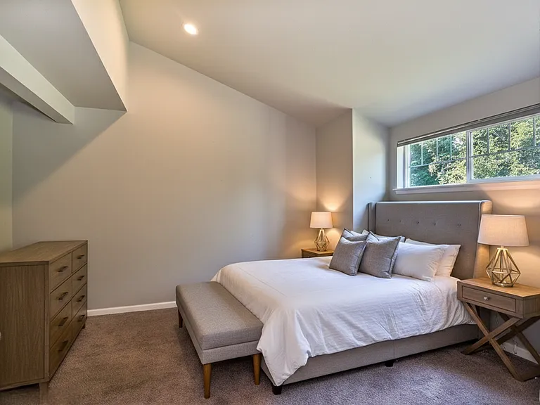 ADA accessible junior suite bedroom on the main floor with wide double door entry.