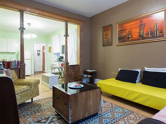 staged photo of living room - room has since been painted / renovated