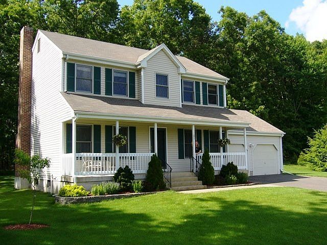 Wonderful colonial in a neighborhood setting. House is set back from the road