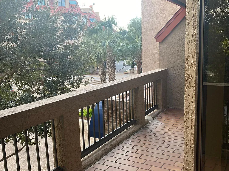 Deck overlooking courtyard in Shelter Cove
