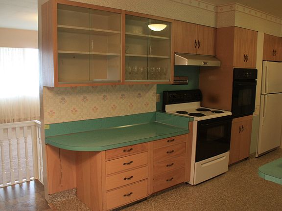 Desk and glass cabinetry