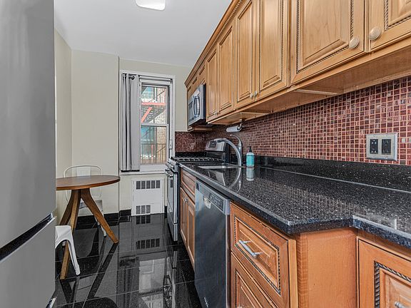 4th image of 34-15 74th St APT 2R