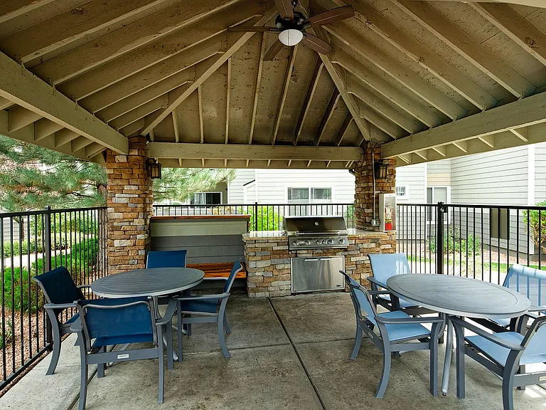Enjoy al fresco dining and relaxation in this beautiful outdoor patio space.