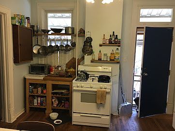 Kichen, with door leading to back porch and backyard.