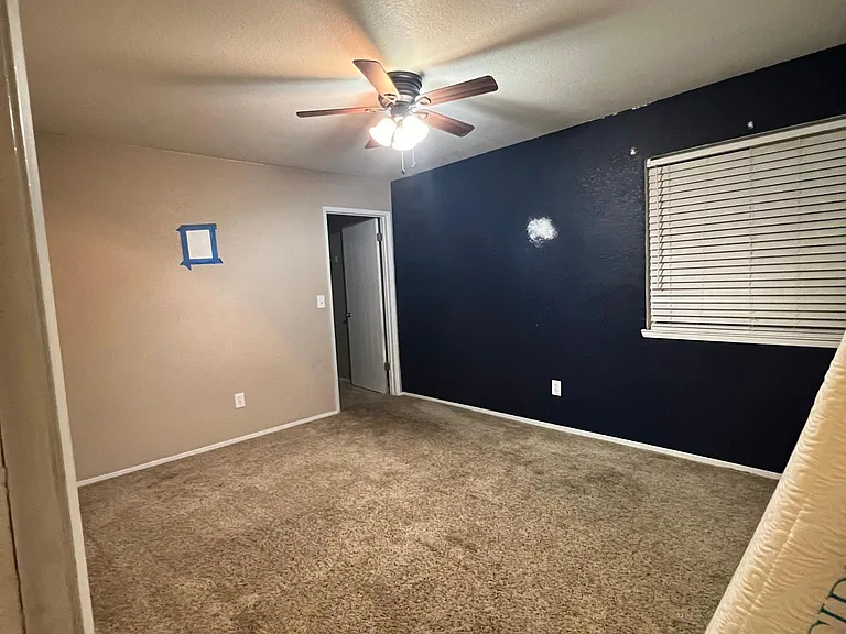 Second bedroom with carpet