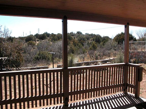 back porch with views backed up to walking trails