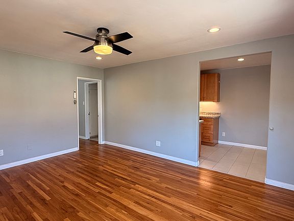 Living room, looking towards eat-in kitchen.