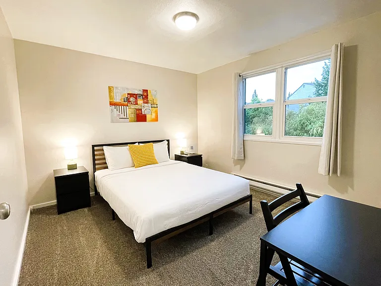 Bedroom 1 (staged for concept only - unit rents unfurnished)