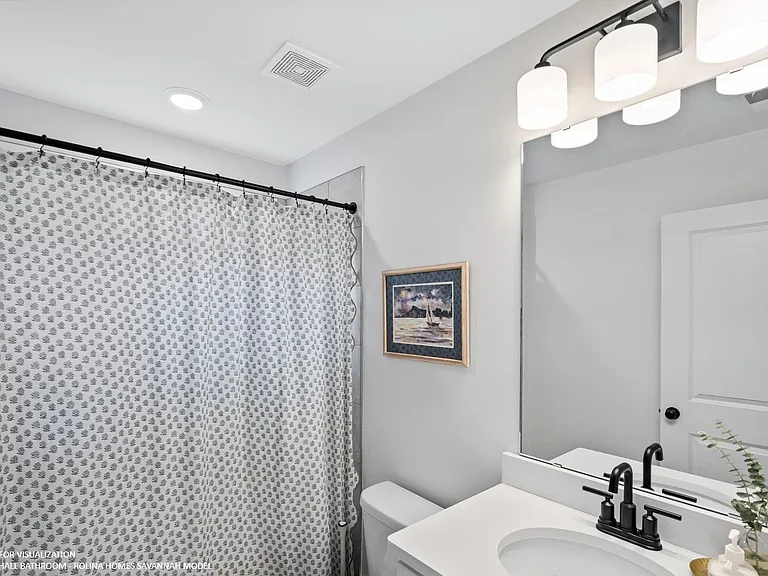 SHARED HALL BATHROOM (2ND FLOOR) PICTURE FROM A DIFFERENT SAVANNAH MODEL RECENTLY BUILT BY ROLINA HOMES