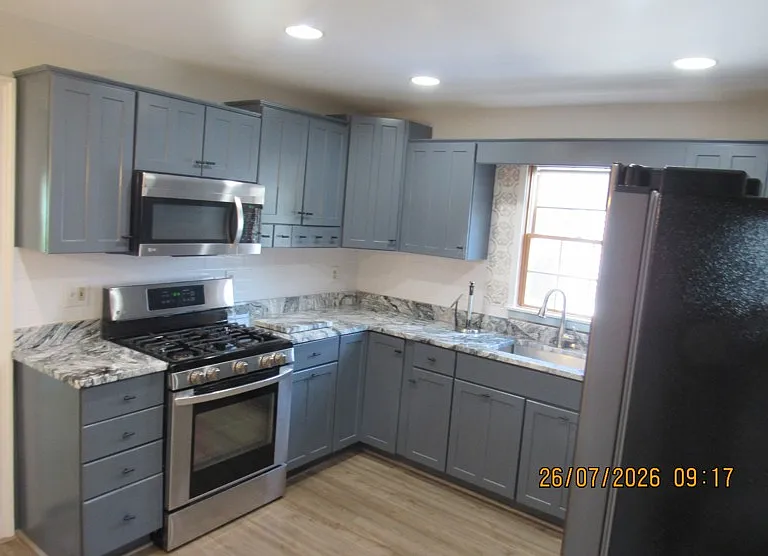 gorgeous cabinet packed kitchen with granite and all appliances included