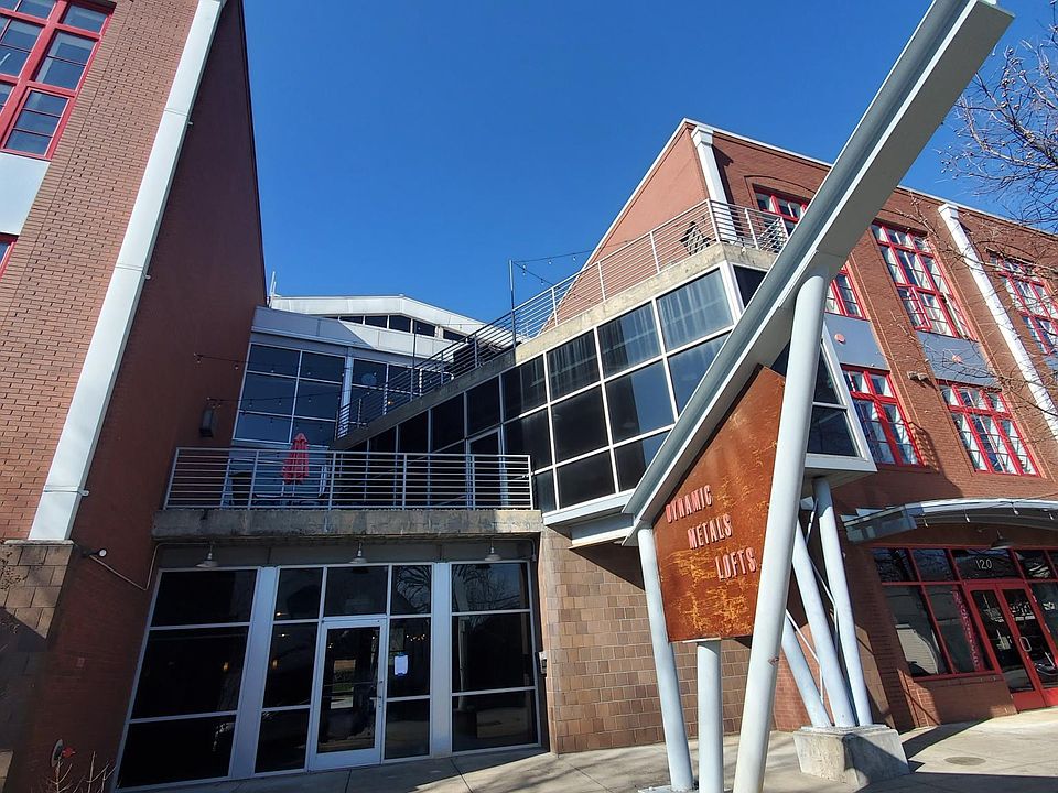 Dynamic Metals Lofts front entrance and east side patios.