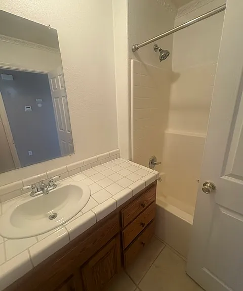 Two bathrooms: main bath with master room with private bathroom, walk-in shower.