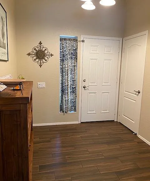 Entry Way, front door and hall closet.
