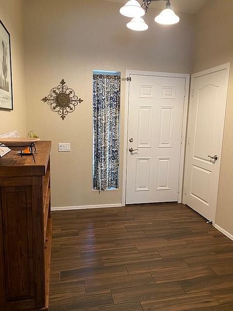 Entry Way, front door and hall closet.
