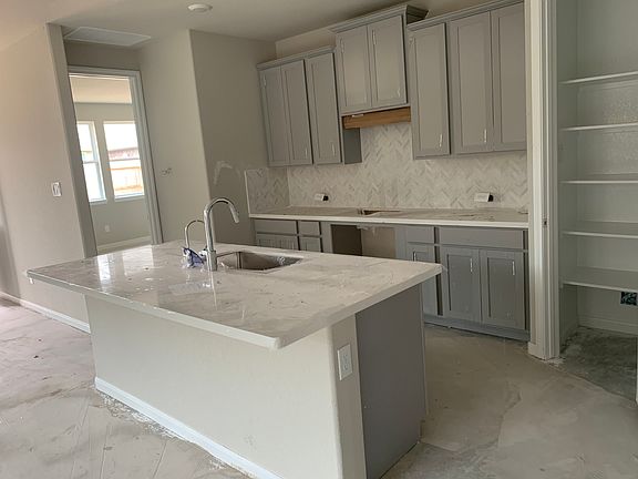 Construction progress - kitchen with center island and walk-in pantry