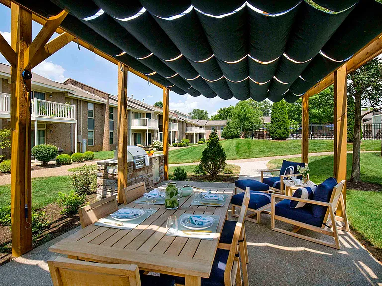 Outdoor grills and shaded dining area