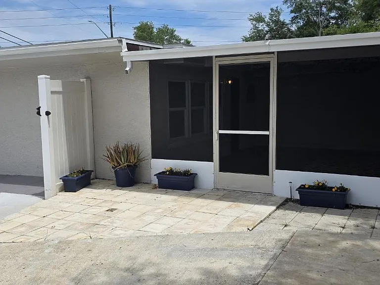 Back patio and enclosed back yard