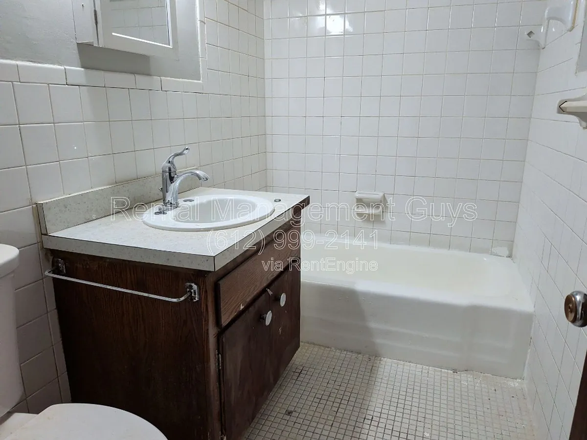 Building Photo - 3841 Thomas Ave N #2
