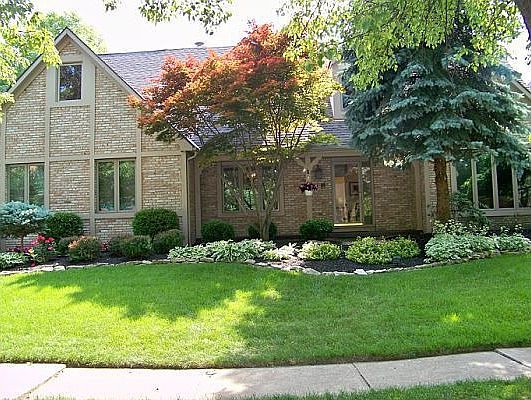 Tremendous curb appeal and professional landscaping at this 4 bedroom house!  