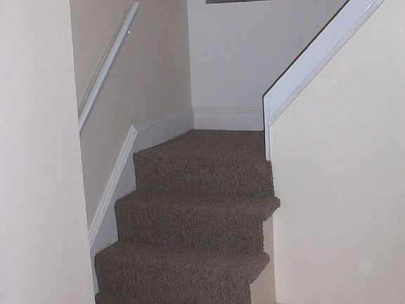 Living room new carpet on staircase