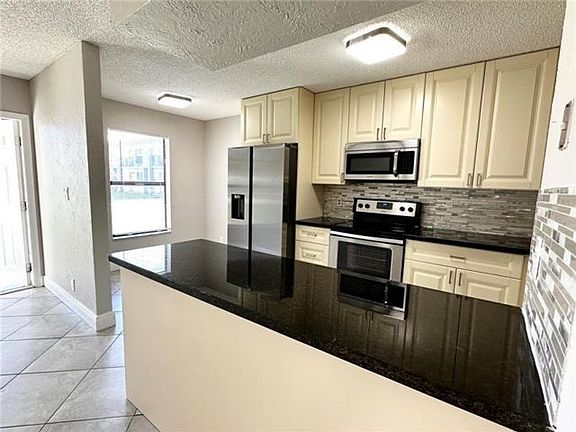 2nd image of 5515 Courtyard Dr #11A