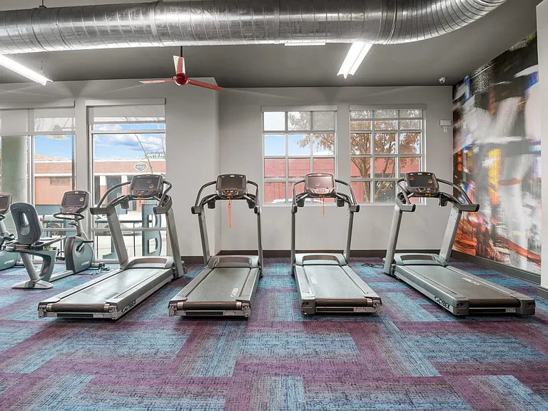 Cardio equipment in the fitness center at South Side Flats in Dallas TX