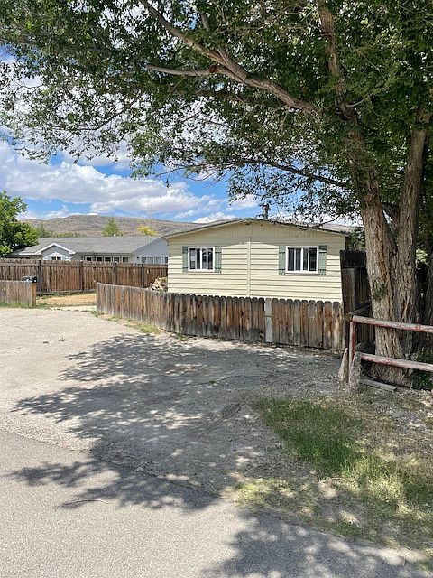 Welcome to 529 W Miller Street in Rawlins, WY with plenty of off-street parking in the front and rear of the house.