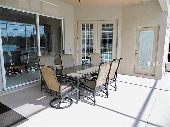 Large lanai with outside pool bathroom with shower