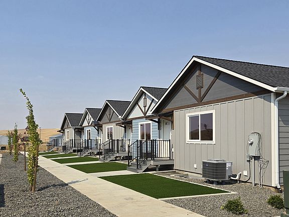 No maintenance landscaping with artificial lawn.